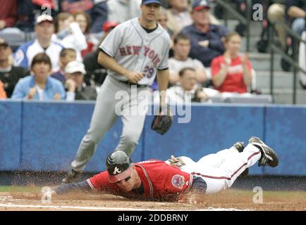 Washington Nationals third baseman Ryan Zimmerman (11) stretches out as he  talks to Atlanta Braves left fielder Justin Upton (R) prior to the first  inning at Turner Field in Atlanta, August 16