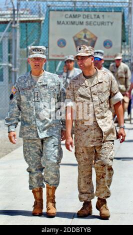 NO FILM, NO VIDEO, NO TV, NO DOCUMENTARY - General Bantz Craddock (left) talks with Navy Lt. Abuhena M. Saifulislam at the Camp Delta detention facility at Guantanamo Bay, Cuba, Sunday, June 11, 2006. Three detainees at the camp were found dead Saturday after they committed suicide by hanging themselves. Photo by Todd Sumlin/Charlotte Observer/KRT/ABACAPRESS.COM Stock Photo