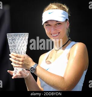 NO FILM, NO VIDEO, NO TV, NO DOCUMENTARY - Germany's Sabine Lisicki celebrates with his trophy after defeating France's Aravane Rezai 6-2, 6-1 in their Final match during Texas Open tennis tournament in Grapevine, USA on August 27, 2011. Photo by Max Faulkner/Fort Worth Star-Telegram/MCT/ABACAPRESS.COM Stock Photo