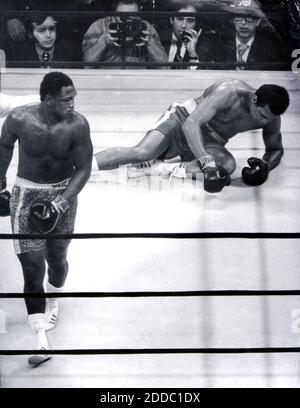 In this 1971 file photo, Joe Frazier heads for a neutral corner