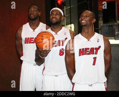 NO FILM, NO VIDEO, NO TV, NO DOCUMENTARY - Miami Heat's Dwyane Wade, from left, LeBron James and Chris Bosh pose for portrait during Miami Heat Media Day at AmericanAirlines Arena in Miami, FL, USA on December 12, 2011. Photo by David Santiago/El Nuevo Herald/MCT/ABACAPRESS.COM Stock Photo