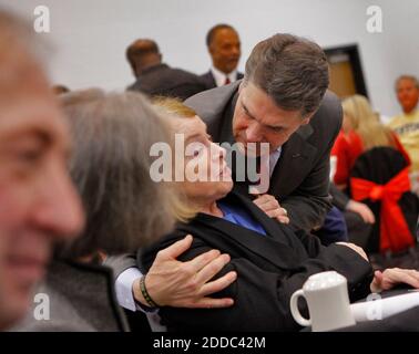 Republican presidential hopeful Gov. Rick Perry speaks to a small group ...