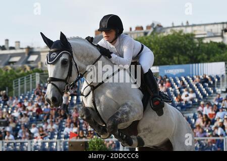 Jennifer Gates competes on day 2 of the 5th Longines Paris Eiffel Jumping on July 5, 2018 in Paris, France. Photo by Laurent Zabulon/ABACAPRESS.COM Stock Photo