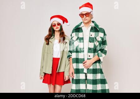young couple are standing next to each 