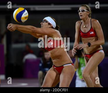 NO FILM, NO VIDEO, NO TV, NO DOCUMENTARY - USA's Misty May-Treanor, left, plays the ball in front of teammate Kerri Walsh Jennings en route to the gold medal in women's beach volleyball at Horse Guard Parade during the 2012 Summer Olympic Games in London, UK, Wednesday, August 8, 2012. Photo by Nhat V. Meyer/San Jose Mercury News/MCT/ABACAPRESS.COM Stock Photo