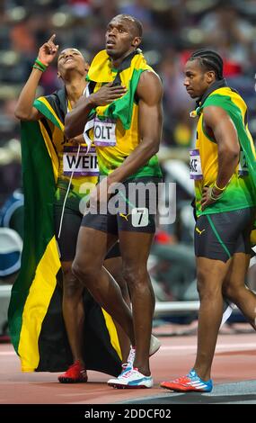 NO FILM, NO VIDEO, NO TV, NO DOCUMENTARY - Gold medalist Usain Bolt of Jamaica, center, celebrated with his teammates and bronze medalist Warren Weir, left, and silver medalist Yohan Blake, right, in the men's 200m final in a time of 19.32 at Olympic Stadium during the 2012 Summer Olympic Games in London, UK on August 9, 2012. Photo by David Eulitt/Kansas City Star/MCT/ABACAPRESS.COM Stock Photo