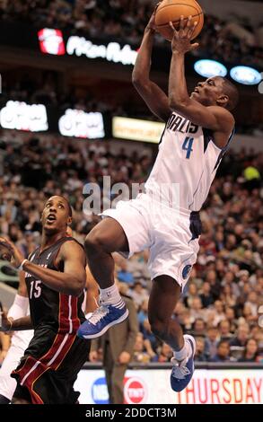 NO FILM, NO VIDEO, NO TV, NO DOCUMENTARY - Dallas Mavericks point guard Darren Collison shoots over Miami Heat point guard Mario Chalmers during an NBA game at the American Airlines Center in Dallas, TX, USA December 20, 2012. Photo by Ron T. Ennis/Fort Worth Star-Telegram/MCT/ABACAPRESS.COM Stock Photo