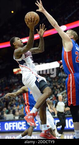 NO FILM, NO VIDEO, NO TV, NO DOCUMENTARY - Atlanta Hawks shooting guard Louis Williams (3) shoots against Detroit Pistons small forward Kyle Singler (25) in the first half at Philips Arena in Atlanta, GA, USA on December 26, 2012. Atlanta won, 126-119, in double OT. Photo by Hyosub Shin/Atlanta Journal-Constitution/MCT/ABACAPRESS.COM Stock Photo