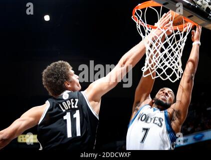 NO FILM, NO VIDEO, NO TV, NO DOCUMENTARY - Brook Lopez (11) of the Minnesota Timberwolves blocks a shot by Derrick Williams (7) of the Brooklyn Nets in the first quarter at the Target Center in Minneapolis, MN, USA on January 23, 2013. Photo by Carlos Gonzalez/Minneapolis Star Tribune/MCT/ABACAPRESS.COM Stock Photo