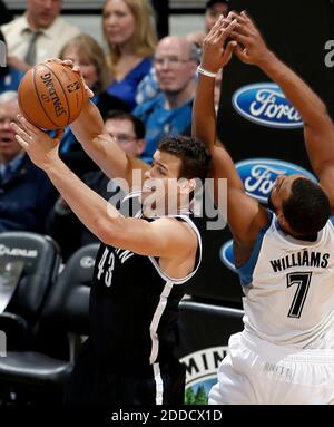 NO FILM, NO VIDEO, NO TV, NO DOCUMENTARY - The Brooklyn Nets' Kris Humphries and the Minnesota Timberwolves' Derrick Williams (7) fight for a rebound in the third quarter at the Target Center in Minneapolis, MN, USA on January 23, 2013. Photo by Carlos Gonzalez/Minneapolis Star Tribune/MCT/ABACAPRESS.COM Stock Photo