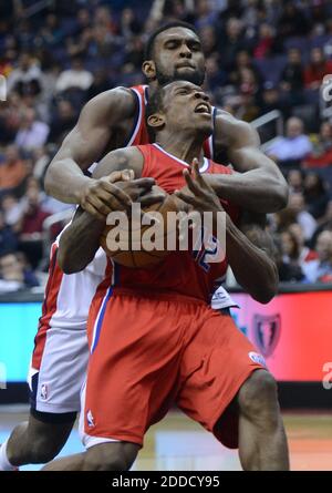 NO FILM, NO VIDEO, NO TV, NO DOCUMENTARY - Washington Wizards small forward Chris Singleton (31), back, fouls Los Angeles Clippers point guard Eric Bledsoe (12) on a move to the basket in the second quarter at the Verizon Center in Washington, DC, USA on February 4, 2013. The Wizards defeated the Clippers, 98-90. Photo by Chuck Myers/MCT/ABACAPRESS.COM Stock Photo