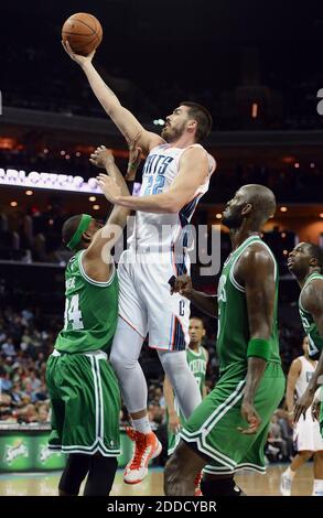 NO FILM, NO VIDEO, NO TV, NO DOCUMENTARY - Charlotte Bobcats forward/center Byron Mullens drives to the basket against Boston Celtics forward Paul Pierce (34) during first-half action at Time Warner Cable Arena in Charlotte, NC, USA on February 11, 2013. Mullens was called for a charge on the play. Photo by Jeff Siner/Charlotte Observer/MCT/ABACAPRESS.COM Stock Photo