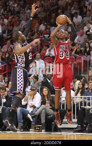 NO FILM, NO VIDEO, NO TV, NO DOCUMENTARY - Miami Heat guard Ray Allen shoots a three-point shoots against Sacramento Kings defender Marcus Thornton in the second quarter at the American Airlines Arena in Miami, FL, USA on February 26, 2013. The Heat defeated the Kings in double overtime, 141-129. Photo by David Santiago/El Nuevo Herald/MCT/ABACAPRESS.COM Stock Photo