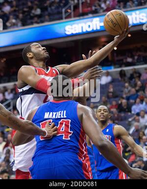 NO FILM, NO VIDEO, NO TV, NO DOCUMENTARY - Washington Wizards point guard John Wall (2) scores on a layup over Detroit Pistons power forward Jason Maxiell (54) during the second half of their game played at the Verizon Center in Washington, DC, USA on February 27, 2013. Detroit defeated Washington 96-95. Photo by Harry E. Walker/MCT/ABACAPRESS.COM Stock Photo