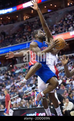 NO FILM, NO VIDEO, NO TV, NO DOCUMENTARY - Detroit Pistons point guard Will Bynum (12) scores against Washington Wizards small forward Chris Singleton (31) during the first half of their game played at the Verizon Center in Washington, DC, USA on February 27, 2013. Detroit defeated Washington 96-95. Photo by Harry E. Walker/MCT/ABACAPRESS.COM Stock Photo