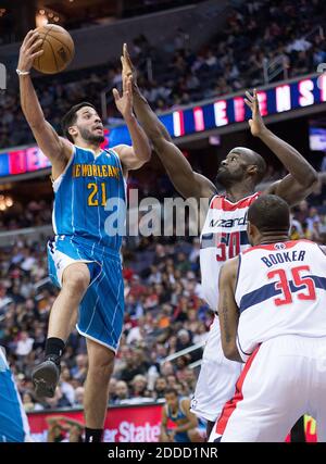 NO FILM, NO VIDEO, NO TV, NO DOCUMENTARY - New Orleans Hornets point guard Greivis Vasquez (21) drives to the basket and shoots over Washington Wizards center Emeka Okafor (50) during the second half of their game played at the Verizon Center in Washington, DC, USA on March 15, 2013. Washington defeated New Orleans 96-87. Photo by Harry E. Walker/MCT/ABACAPRESS.COM Stock Photo