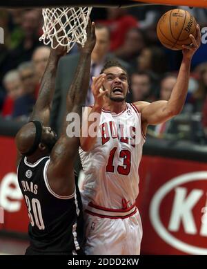 NO FILM, NO VIDEO, NO TV, NO DOCUMENTARY - Chicago Bulls' Joakim Noah scores against Brooklyn Nets' Andray Blatche during 1st-quarter action in Game 6 of the NBA Eastern Conference playoffs at the United Center in Chicago, Illinois, USA on Thursday, May 2, 2013. Photo by Scott Strazzante/Chicago Tribune/MCT/ABACAPRESS.COM Stock Photo