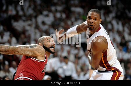 NO FILM, NO VIDEO, NO TV, NO DOCUMENTARY - Miami Heat forward Chris Bosh is called for a foul for pushing Chicago Bulls Carlos Boozer during the second quarter of the NBA Eastern Conference playoffs at the AmericanAirlines Arena in Miami, Florida, USA on Wednesday, May 6, 2013. Photo by Michael Laughlin/Sun Sentinel/MCT/ABACAPRESS.COM Stock Photo