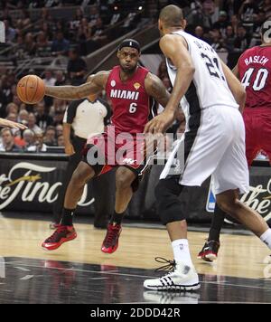 NO FILM, NO VIDEO, NO TV, NO DOCUMENTARY - Miami Heat forward LeBron James drives against San Antonio Spurs forward Tim Duncan during the first quarter in Game 3 of the NBA Finals, at the AT&T Center in San Antonio, TX, USA on June 11, 2013. Photo by David Santiago/El Nuevo Herald/MCT/ABACAPRESS.COM Stock Photo