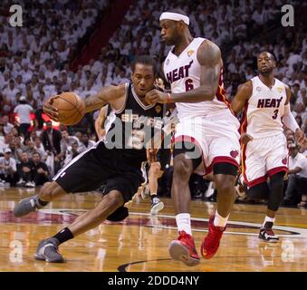 NO FILM, NO VIDEO, NO TV, NO DOCUMENTARY - The San Antonio Spurs' Kawhi Leonard (2) drives the lane against the Miami Heat's LeBron James (6) in Game 6 of the NBA Finals at the AmericanAirlines Arena in Miami, FL, USA June 18, 2013. Photo by Allen Eyestone/Palm Beach Post/MCT/ABACAPRESS.COM Stock Photo