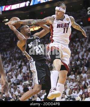 NO FILM, NO VIDEO, NO TV, NO DOCUMENTARY - The San Antonio Spurs' Tim Duncan (21) is fouled by the Miami Heat's Chris Andersen (11) in the second quarter in Game 6 of the NBA Finals, at the AmericanAirlines Arena in Miami, FL, USA on June 18, 2013. Photo by Bill Ingram/Palm Beach Post/MCT/ABACAPRESS.COM Stock Photo