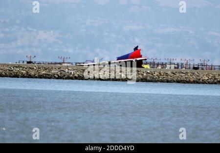 NO FILM, NO VIDEO, NO TV, NO DOCUMENTARY - The tail of Asiana Airlines Flight 214, a Boeing 777 arriving from Seoul, South Korea, after the plane crashed on landing at San Francisco International Airport on Saturday, July 6, 2013, in San Francisco, CA, USA. Photo by LiPo Ching/Bay Area News Group/MCT/ABACAPRESS.COM Stock Photo