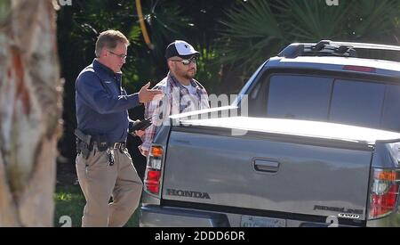 NO FILM, NO VIDEO, NO TV, NO DOCUMENTARY - George Zimmerman, the former Neighborhood Watch volunteer acquitted of murder in the shooting of 17-year-old Trayvon Martin, walks toward his vehicle in Lake Mary, Florida, USA, on Monday, September 9, 2013. Police are investigating a 'possible domestic battery' involving Zimmerman, Lake Mary police officer Zach Hudson said Monday afternoon. The police spokesman said it was his understanding that a gun was involved. Photo by Red Huber/Orlando Sentinel/MCT/ABACAPRESS.COM Stock Photo