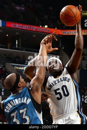 NO FILM, NO VIDEO, NO TV, NO DOCUMENTARY - Memphis Grizzlies forward Zach Randolph (50) is fouled by Minnesota Timberwolves forward Dante Cunningham (33) at the FedExForum in Memphis, TN, USA on December 15, 2013. Photo by Nikki Boertman/The Commercial Appeal/MCT/ABACAPRESS.COM Stock Photo