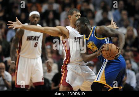 NO FILM, NO VIDEO, NO TV, NO DOCUMENTARY - Miami Heat forward Shane Battier guards Golden State Warriors forward Draymond Green during the first half at AmericanAirlines Arena in Miami, FL, USA on January 2, 2014. Photo by Michael Laughlin/Sun Sentinel/MCT/ABACAPRESS.COM Stock Photo