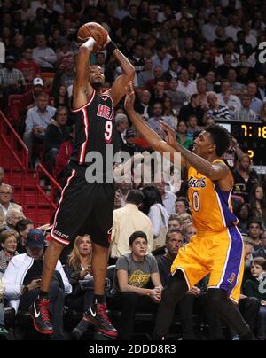 NO FILM, NO VIDEO, NO TV, NO DOCUMENTARY - The Miami Heat's Rashard Lewis shoots over the Los Angeles Lakers' Nick Young during the second quarter at the AmericanAirlines Arena in Miami, FL, USA on January 23, 2014. Photo by David Santiago/El Nuevo Herald/MCT/ABACAPRESS.COM Stock Photo