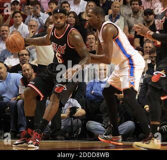 NO FILM, NO VIDEO, NO TV, NO DOCUMENTARY - Miami Heat's LeBron James drives against Oklahoma City Thunder's Kevin Durant during the first quarter at AmericanAirlines Arena in Miami, FL, USA on January 29, 2014. Photo by Pedro Portal/El Nuevo Herald/MCT/ABACAPRESS.COM Stock Photo