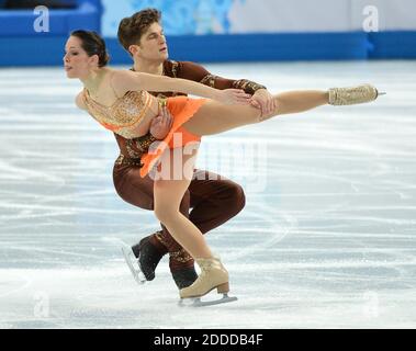 NO FILM, NO VIDEO, NO TV, NO DOCUMENTARY - Italy's Nicole Della Monica and Matteo Guarise perform their figure skating short program during the Winter Olympics at the Iceberg Skating Palace in Sochi, Russia, Tuesday, February 11, 2014. Photo by Chuck Myers/MCT/ABACAPRESS.COM Stock Photo