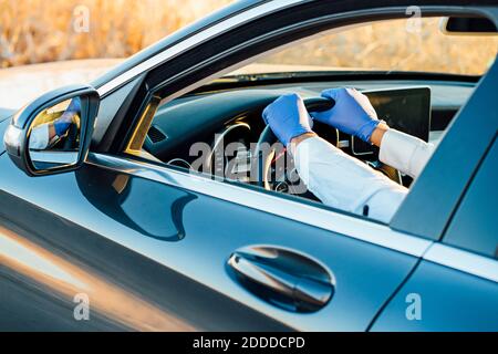Hands of man on car steering wheel Stock Photo