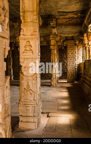 India, Karnataka, Hampi, Carved columns at temple of Vijaya Vittala complex in desert valley of Hampi Stock Photo