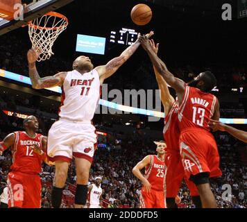 NO FILM, NO VIDEO, NO TV, NO DOCUMENTARY - Miami Heat forward Chris Andersen fights for a loose ball with Houston Rockets James Harden in the second quarter at the AmericanAirlines Arena in Miami, FL, USA ON March 16, 2014. Photo by Hector Gabino/El Nuevo Herald/MCT/ABACAPRESS.COM Stock Photo