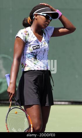 NO FILM, NO VIDEO, NO TV, NO DOCUMENTARY - Victoria Duval of the U.S. reacts after a missed shot against Kiki Bertens of the Netherlands during their first-round match at the Sony Open tennis tournament at Crandon Park in Key Biscayne, FL, USA on March 19, 2014. Bertens advanced, 7-6, 6-1. Photo by Charles Trainor Jr./Miami Herald/MCT/ABACAPRESS.COM Stock Photo