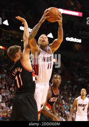 NO FILM, NO VIDEO, NO TV, NO DOCUMENTARY - Miami Heat forward Chris Andersen goes over the defense of Portland Trail Blazers Meyers Leonard in the second quarter at the AmericanAirlines Arena in Miami, FL, USA on March 24, 2014. Photo by Hector Gabino/El Nuevo Herald/MCT/ABACAPRESS.COM Stock Photo