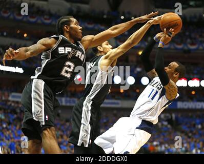 NO FILM, NO VIDEO, NO TV, NO DOCUMENTARY - San Antonio Spurs Kawhi Leonard (2) and Danny Green (4) pressure Dallas Mavericks guard Monta Ellis (11) during Game 4 of the NBA Western Conference quarterfinals at the American Airlines Center in Dallas, TX, USA on April 28, 2014. The Spurs defeated the Mavericks 93-89. Photo by Ron Jenkins/Fort Worth Star-Telegram/MCT/ABACAPRESS.COM Stock Photo