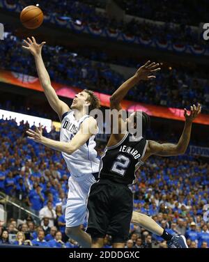 NO FILM, NO VIDEO, NO TV, NO DOCUMENTARY - Dallas Mavericks forward Dirk Nowitzki (41) drives past San Antonio Spurs forward Kawhi Leonard (2) during Game 4 of the NBA Western Conference quarterfinals at the American Airlines Center in Dallas, TX, USA on April 28, 2014. The Spurs defeated the Mavericks 93-89. Photo by Ron Jenkins/Fort Worth Star-Telegram/MCT/ABACAPRESS.COM Stock Photo