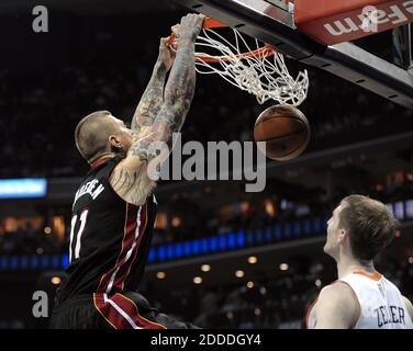 NO FILM, NO VIDEO, NO TV, NO DOCUMENTARY - Miami Heat forward Chris Andersen dunks the ball in front of ther Charlotte Bobcats' Cody Zeller during the first half of Game 4 of the NBA Eastern Conference quarterfinals at Time Warner Cable Arena in Charlotte, NC, USA on April 28, 2014. Photo by Michael Laughlin/Sun Sentinel/MCT/ABACAPRESS.COM Stock Photo