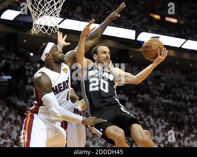 NO FILM, NO VIDEO, NO TV, NO DOCUMENTARY - Miami Heat forward LeBron James defends San Antonio Spurs guard Manu Ginobili during the first half in Game 3 of the NBA Finals at AmericanAirlines Arena in Miami, FL, USA on June 10, 2014. Photo by Michael Laughlin/Sun Sentinel/MCT/ABACAPRESS.COM Stock Photo