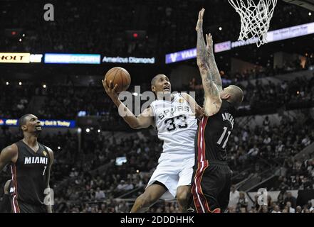 NO FILM, NO VIDEO, NO TV, NO DOCUMENTARY - San Antonio Spurs center Boris Diaw scores on Miami Heat forward Chris Andersen during the first half in Game 5 of the NBA Finals at the AT&T Center in San Antonio, TX, USA, on Sunday, June 15, 2014. Photo by Michael Laughlin/Sun Sentinel/MCT/ABACAPRESS.COM Stock Photo