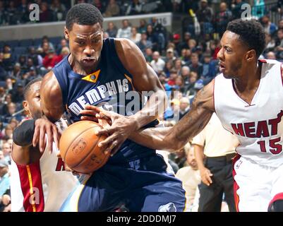 NO FILM, NO VIDEO, NO TV, NO DOCUMENTARY - Memphis Grizzlies' Tony Allen tries to hold onto the ball under pressure from Miami Heat's Dwyane Wade, left, and Mario Chalmers at FedExForum in Memphis, TN, USA on December 7, 2014. Photo by Nikki Boertman/The Commercial Appeal/TNS/ABACAPRESS.COM Stock Photo