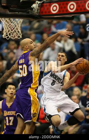 NO FILM, NO VIDEO, NO TV, NO DOCUMENTARY - Minnesota Timberwolves guard Zach LaVine (8) tries to shoot around the defense of Los Angeles Lakers center Robert Sacre (50) during the fourth quarter at the Target Center in Minneapolis, MN, USA on December 14, 2014. Photo by Jeff Wheeler/Minneapolis Star Tribune/TNS/ABACAPRESS.COM Stock Photo