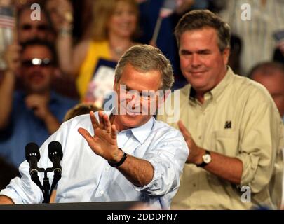 NO FILM, NO VIDEO, NO TV, NO DOCUMENTARY - File photo : President George W. Bush greets supporters as brother Jeb Bush looks on, at the Coconut Grove Convention Center on Oct. 31, 2004 in Miami, Fla. Appearing before a raucous rally in front of thousands of supporters in Miami on Monday June 15, 2015, former Florida governor Jeb Bush officially launched his presidential election campaign. Photo by Jeffrey Boan/Miami Herald/TNS/ABACAPRESS.COM Stock Photo