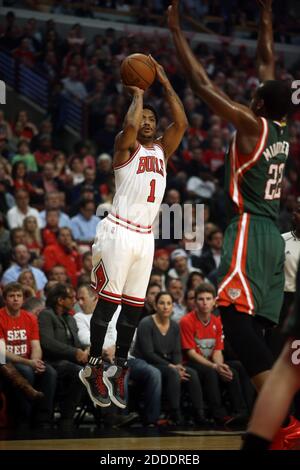 NO FILM, NO VIDEO, NO TV, NO DOCUMENTARY - Chicago Bulls guard Derrick Rose (1) shoots over Milwaukee Bucks guard Khris Middleton (22) during the first half at the United Center in Chicago, IL, USA on April 20, 2015. Photo by Brian Cassella/Chicago Tribune/TNS/ABACAPRESS.COM Stock Photo