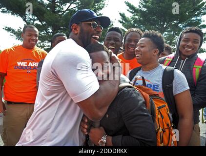 NO FILM, NO VIDEO, NO TV, NO DOCUMENTARY - Former Baltimore Ravens star Ray Lewis hugs Azariah Bratton-Bey Jr., 17, a senior running back on Frederick Douglass High's football team in Baltimore, as Ravens players, coaches and staff visit schools on Thursday, April 30, 2015, to provide positive support as protests continue following the recent death of Freddie Gray while in the custody of Baltimore police. Photo by Kenneth K. Lam/Baltimore Sun/TNS/ABACAPRESS.COM Stock Photo