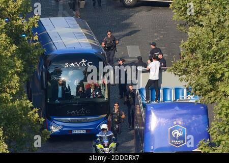 File photo dated July 16, 2018 of Alexandre Benalla (beard and glasses) taking part in the security of World Cup champions parade down the Champs Elysees in Paris, France. Benalla now security advisor to French president Emmanuel Macron has been caught out impersonating a riot policeman in order to beat up anti-government protestors. Astonishing video footage, released by Lemonde.fr, captured at a street demonstration in Paris shows Alexandre Benalla, who is in his mid-30s, attacking two young protesters, one female, one male. The deputy chief of staff at the Elysee Palace had put on a police Stock Photo