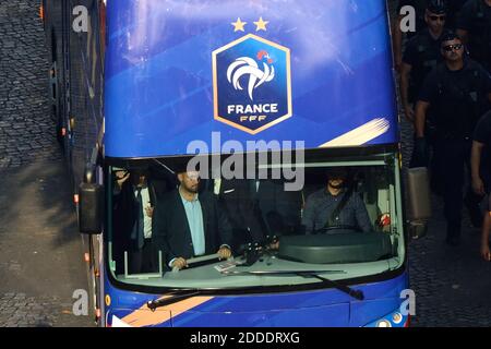 File photo dated July 16, 2018 of Alexandre Benalla (beard and glasses) taking part in the security of World Cup champions parade down the Champs Elysees in Paris, France. Benalla now security advisor to French president Emmanuel Macron has been caught out impersonating a riot policeman in order to beat up anti-government protestors. Astonishing video footage, released by Lemonde.fr, captured at a street demonstration in Paris shows Alexandre Benalla, who is in his mid-30s, attacking two young protesters, one female, one male. The deputy chief of staff at the Elysee Palace had put on a police Stock Photo