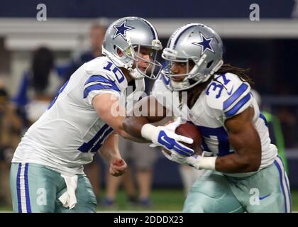 Dallas Cowboys QB Dustin Vaughn (10) eludes San Francisco 49ers in the  second quarter at Levi's Stadium in Santa Clara, California on August 23,  2015. The 49ers defeated the Cowboys 23-6 in